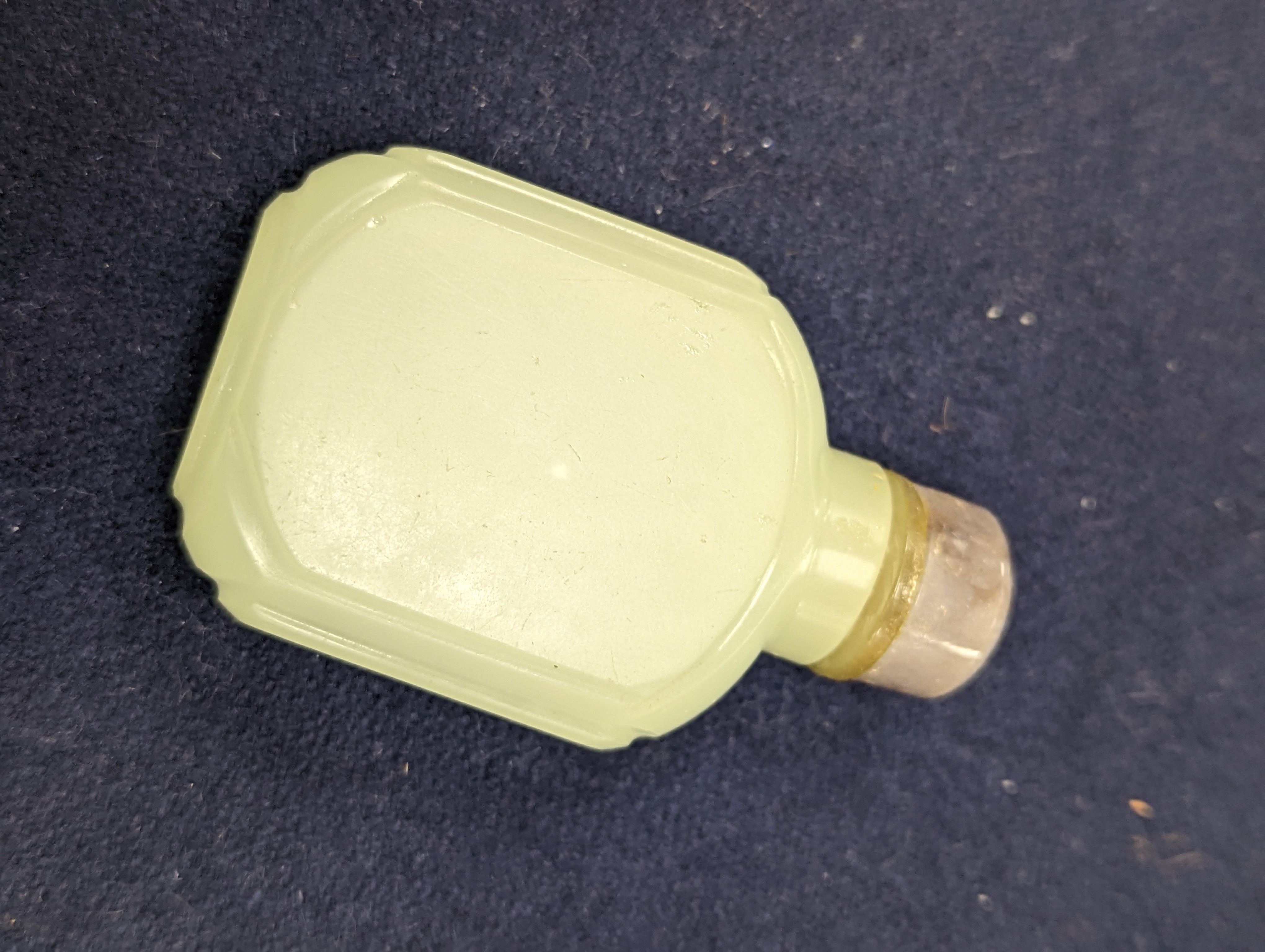 A Chinese jade belt hook, 12.5cm an archer's ring and figure, a stone cup and a glass snuff bottle